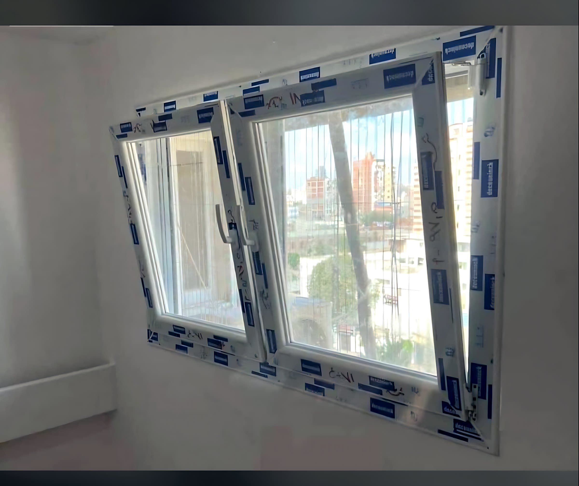 Tilt-and-turn window open in its tilt position