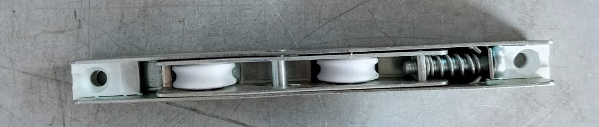 Flat track roller for sliding sashes